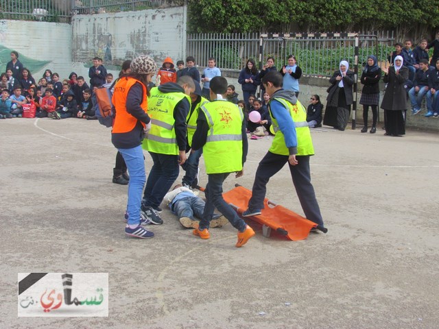 مدرسة جنة ابن رشد الابتدائية وتمرين الدفاع المدني والحذر ومشاركة واسعة من الاهالي 